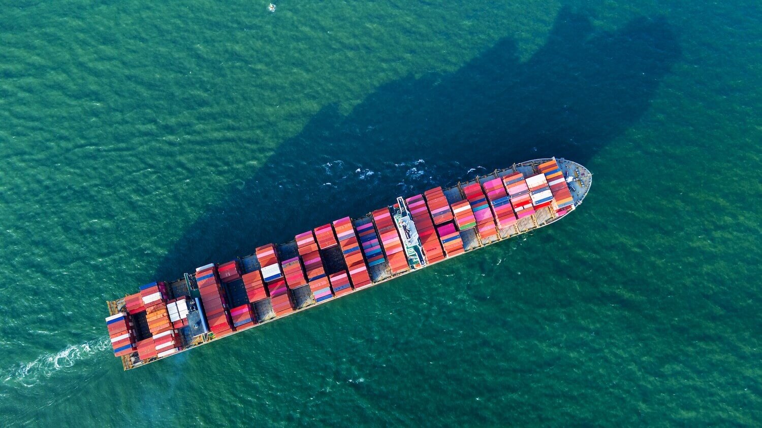 aerial-top-view-of-cargo-ship-carrying-container-a-2025-04-28-21-12-47-utc.jpg